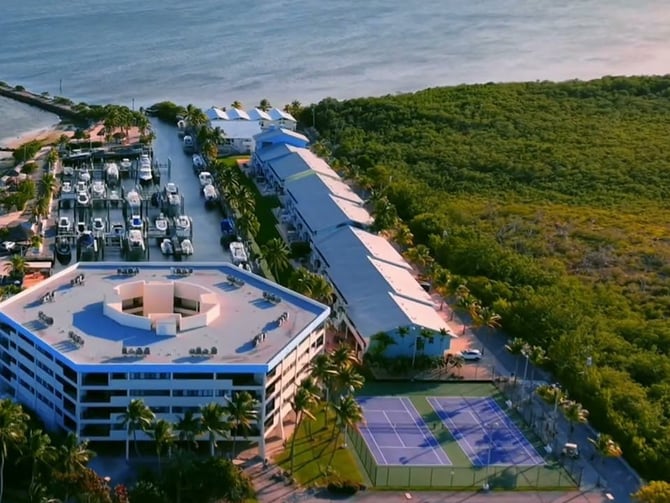 Golden-hour aerial of Kawama Yacht Club marina and resort in Key Largo